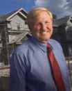 Bob Fleckenstein, president of Summit Contractors Inc., stands in front of Madison Woods Apartments, a 240-unit building under construction in Jacksonville, Fla.