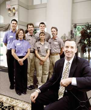 Laramar Group CEO Dave Woodward relies on his property-level staff, like this group at the Hunter's Glen Apartments in Aurora, Ill., to make key pricing and concession decisions for his company.