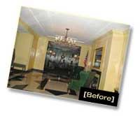 CITY LIGHTS: Restored brass chandeliers and sconces shimmer and reflect the glow of the refurbished marble flooring in the lobby of 930 Fifth Avenue.