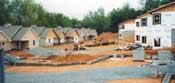 SERENE SETTING: The seniors who collaborated on the ElderSpirit Community helped select this Virginia site, shown here in two phases of construction.