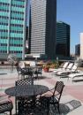 The façade and rooftop deck furnishings of Dallas' Post Wilson Building hint of Paris.