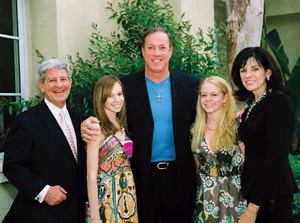Hall-of-fame quarterback Jim Kelly (center) joins the Stack family (L-R): Jeff, Alexandra, Natalie, and Nancy.