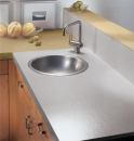 Formica Corp.'s DecoMetal line offers backsplashes in solid metal, while the company's Authentix line features laminate countertops that mimic stainless steel, aluminum, copper, and brass. The metallic colors are a popular alternative to a neutral color scheme. Both products are nonporous, low maintenance, and don't chip. The DecoMetal line offers 10 patterns and textures, while the Authentix collection offers 12 color and design options. For more information, contact Formica at 1-800-FORMICA or visit www.formica.com.