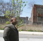 Carl R. Greene, executive director of the Philadelphia Housing Authority, surveys a parcel of land he says sparked a major dispute between PHA and HUD.