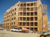 Big Switch: York Residential decided to go with wood-frame construction instead of concrete to make the five-story North Tract Lofts in Arlington, Va., financially feasible.
