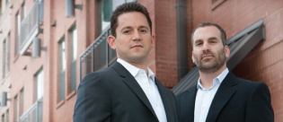 OPPOSITES ATTRACT: The Domain Cos. capitalizes on Matt Schwartz’s (left) financing expertise and Chris Papamichael’s development know-how.