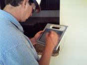 A Doster Construction employee utilizes an F5 tablet PC on the jobsite.