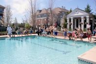 All In: Village Green Cos.' residents at Regents Park of Troy in Troy, Mich., jump into their community pool as part of Splash Day, a summer kick-off party and fundraiser.