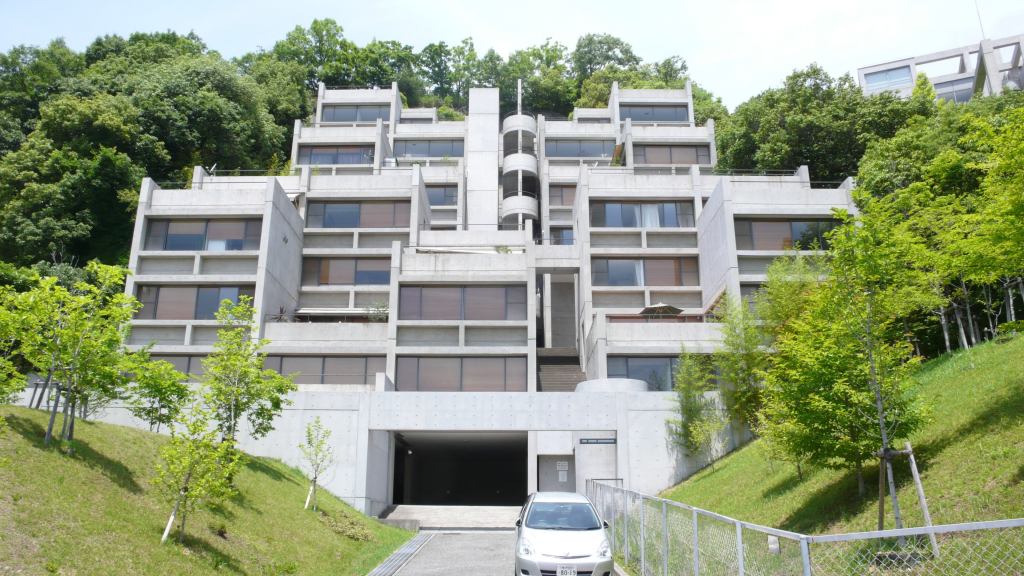 Rokko Housing One • Location: Kobe, Japan • Architect: Tadao Ando Built: 1983 • Units: 20 Notable: The nine-story landmark was built “into” its landscape—a 60-degree slope on the southern edge of the Rokko Mountains. The configuration takes advantage of the site’s natural constraints, resulting in more privacy and expansive views.