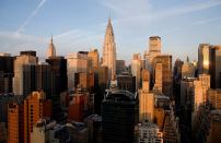 The sun rises on New York City