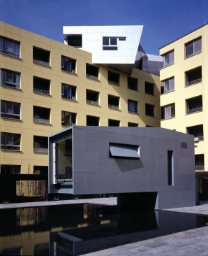 Makuhari Housing • Location: Chiba, Japan • Architect: Steven Holl • Built: 1992 • Units: 190 Notable: The belvedere located at the top of the building offers panoramic views of Tokyo Bay and Mount Fuji. The building also includes retail space, public facilities, and two intimate courtyards.