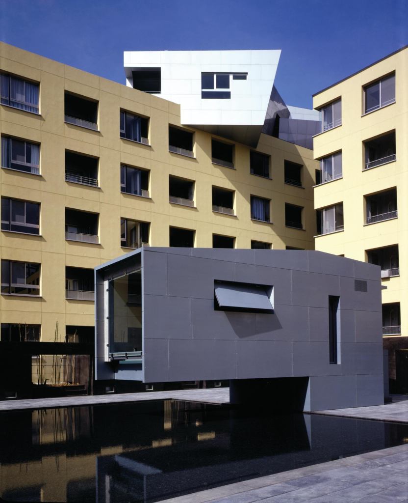 Makuhari Housing • Location: Chiba, Japan • Architect: Steven Holl • Built: 1992 • Units: 190 Notable: The belvedere located at the top of the building offers panoramic views of Tokyo Bay and Mount Fuji. The building also includes retail space, public facilities, and two intimate courtyards.