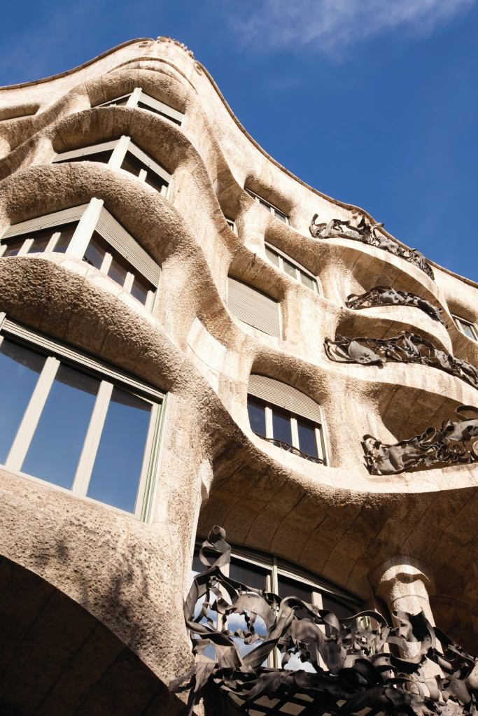 Casa Milà/La Pedrera • Location: Barcelona, Spain • Developer: Pere Milà i Camps • Architect: Antoni Gaudi • Notable: Containing not one straight wall or right angle, La Pedrera (“The Quarry”) seems to have been molded rather than built, both inside and out. The building, constructed from 1906 to 1912, was the first in Europe to include an underground parking garage. It is now a museum.