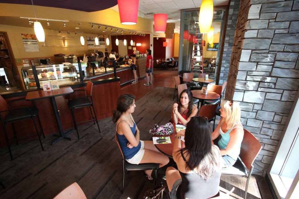 NOT YOUR MOTHER’S DORM: 

Unlike typical university dormitories, Campbell Hall and Salice and Conley Halls at Fordham University offer “urban lifestyle” housing with modern amenities and technologies, including fully furnished apartments boasting air-­conditioning, individual-unit climate control, and kitchens equipped with dishwashers and microwaves. The lobby areas feature laundry facilities, a campus café (shown), a classroom with smart technology, and a large meeting space.