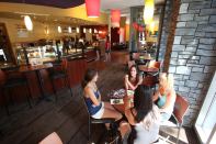 NOT YOUR MOTHER’S DORM: 

Unlike typical university dormitories, Campbell Hall and Salice and Conley Halls at Fordham University offer “urban lifestyle” housing with modern amenities and technologies, including fully furnished apartments boasting air-­conditioning, individual-unit climate control, and kitchens equipped with dishwashers and microwaves. The lobby areas feature laundry facilities, a campus café (shown), a classroom with smart technology, and a large meeting space.