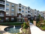 GARDEN AFFAIR: One of the properties Bell Partners sold to Senior Housing Properties Trust this summer was Alta Reserve in Chesapeake, Va. It includes amenities such as detached garages, sunrooms, home offices, and a garden courtyard.