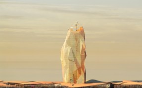 vertical city in sahara desert that looks like boulder