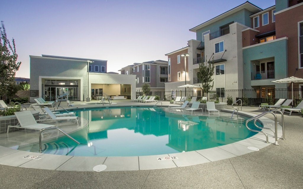 The Calida Group's Elysian at the District property featuring pool deck
