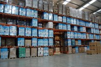 Generic view of a warehouse with unshelved products.