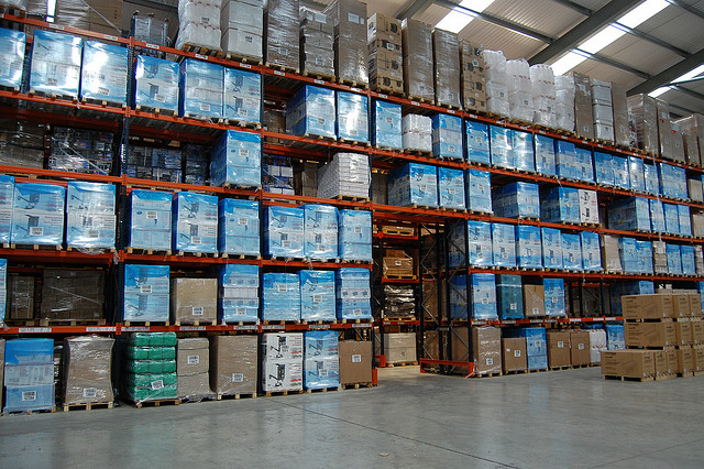 Generic view of a warehouse with unshelved products.