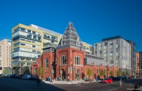 The cornerstone of the project is the historic market located on the corner of the lot, which was salvaged and repurposed into a Giant Food store.