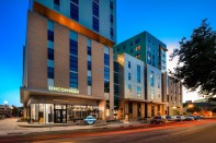 student housing, young professionals, college town, mixed materials, multi-level facade.