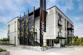 An exterior rendering of one of the five buildings in the Sparc Apartments complex.