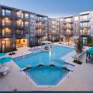 The resort pool at Ablon @ Frisco Square in Frisco, Texas, is one amenity creating the resident lifestyle experience.