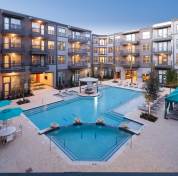 The resort pool at Ablon @ Frisco Square in Frisco, Texas, is one amenity creating the resident lifestyle experience.