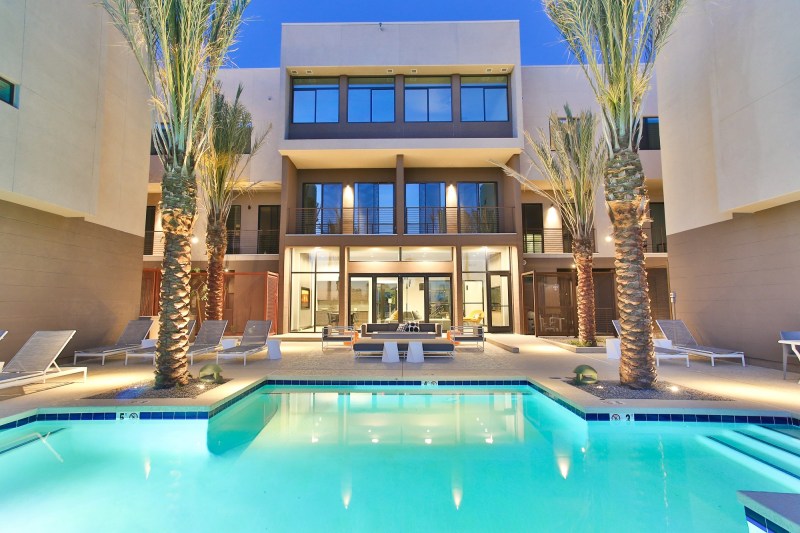 Beside Dusk's pool are lounging spots with a fire pit, and all apartments have either a patio or balcony, many of which face the golf course or greenbelt.