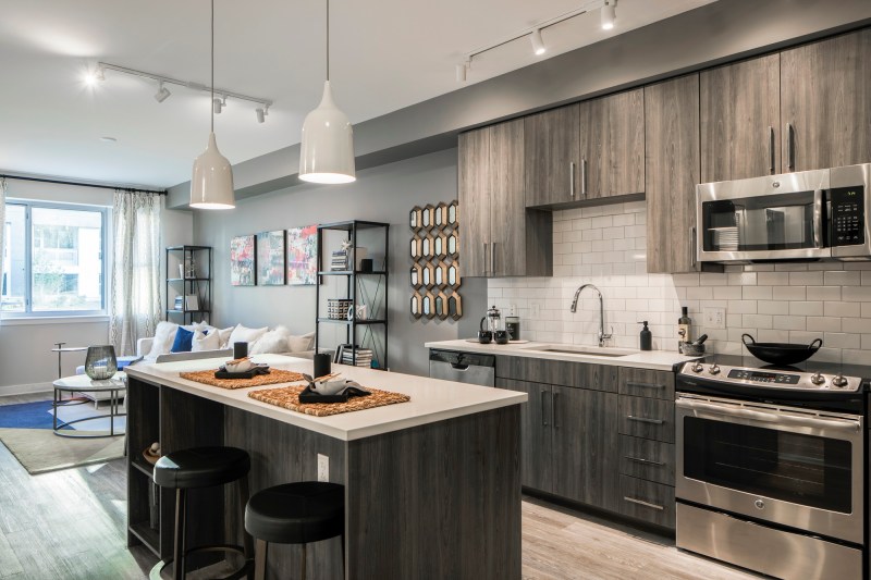 The neutral palette in Anthem House's smaller-scaled apartments is a favorite for appealing to a wide demographic. Bolder hues are reserved for the large public spaces.
