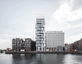 The Silo, a 38-unit apartment tower redeveloped from a former grain silo in Copenhagen, Denmark.
