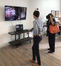 A prospective resident uses virtual reality to tour Bond Cos.' Spoke project.