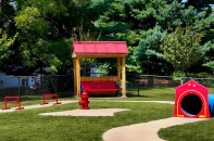 A dog park at Spring Parc in Silver Spring, Md. The ROSS property markets itself prominently as a pet-friendly apartment community.