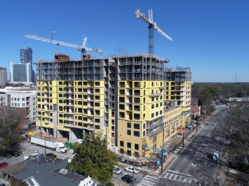 A proprietary Type I light-steel hybrid system incorporating panelized walls from Infinity uses Epicore decking.