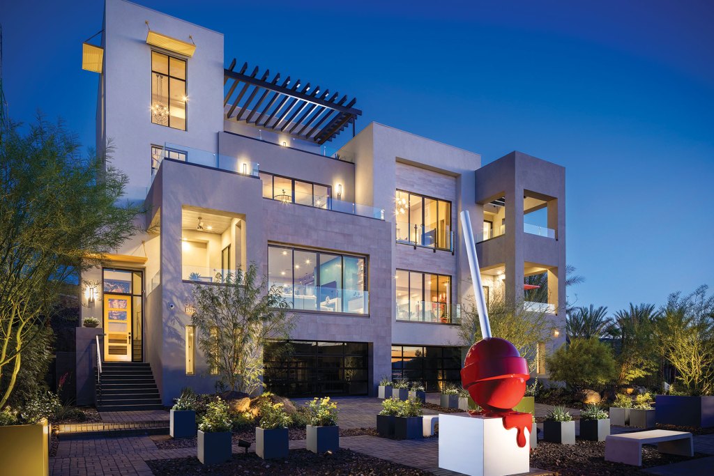 Though the Vu's exterior blends with the desert rockscaping, pops of color come from the desert flowers planted as well as accents of color throughout on doors, window frames, awnings, and even pots and artwork spaced strategically.