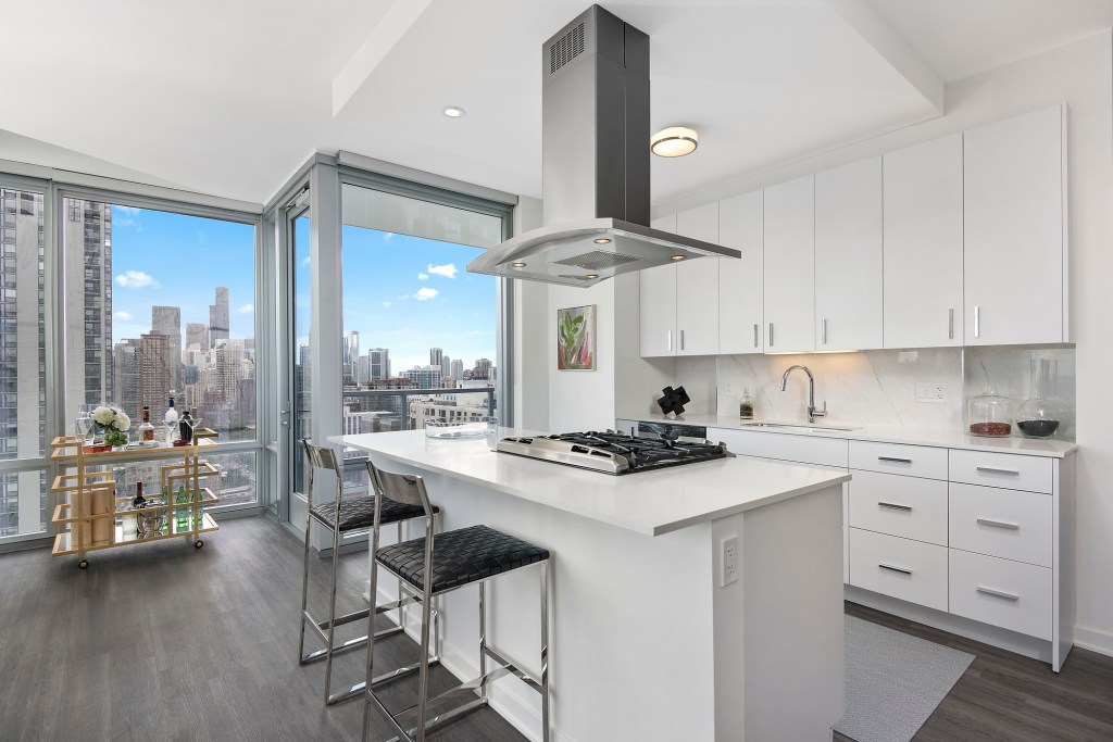 Big floor-to-ceiling windows, luxurious building materials, and high-end appliances are a hallmark of all units at The Sinclair, especially those on the top levels.