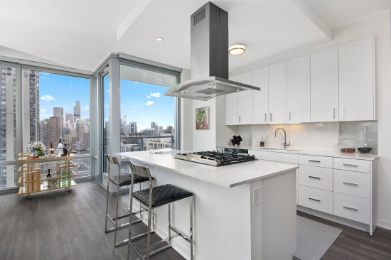 Big floor-to-ceiling windows, luxurious building materials, and high-end appliances are a hallmark of all units at The Sinclair, especially those on the top levels.