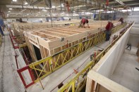 Employees at Guerdon assemble modular components in the factory, gaining time and quality from the controlled environment.
