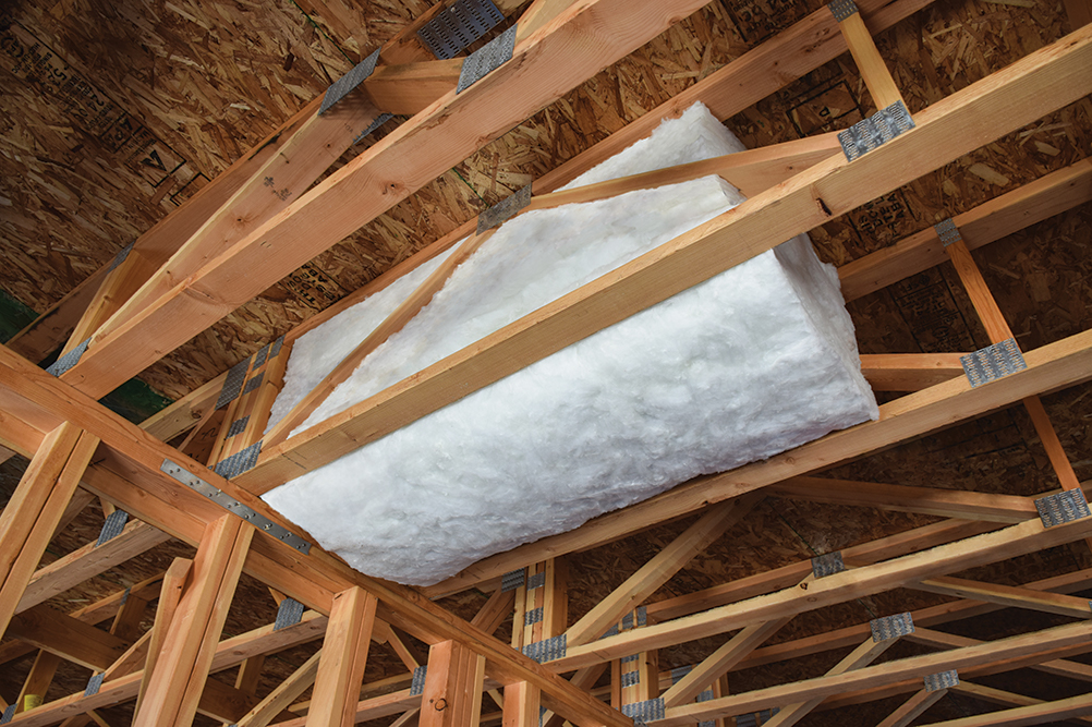 The JM Formaldehyde-free Cavity-SHIELD fiberglass batt, shown here installed in a floor space cavity.