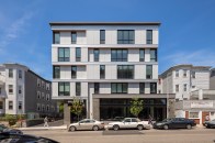 1943 Dot Ave is a four-story, 64-unit multifamily development in Dorchester, Mass.