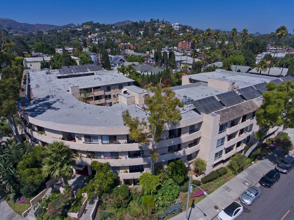 Canyon Drive Manor Apartments, a 137-unit multifamily property in Hollywood, is part of a five-community portfolio in Southern California acquired by Raintree Partners.
