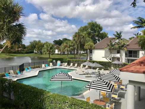 Built around a spring-fed lake, Centro at Davie by ARIUM in Davie, Florida, features one- and two-bedroom apartments. It is one of three South Florida multifamily communities recently sold by CARROLL and PGIM Real Estate.