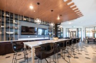 Designed by Eleni Interiors, the Sixteen30 clubhouse includes a cybercafé and other spaces for residents to socialize or work remotely.