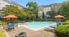 The Townes at Herndon Center, a townhome community near downtown Herndon, Virginia, features a pool and a fitness center as well as one- and two-car attached garages for each unit.