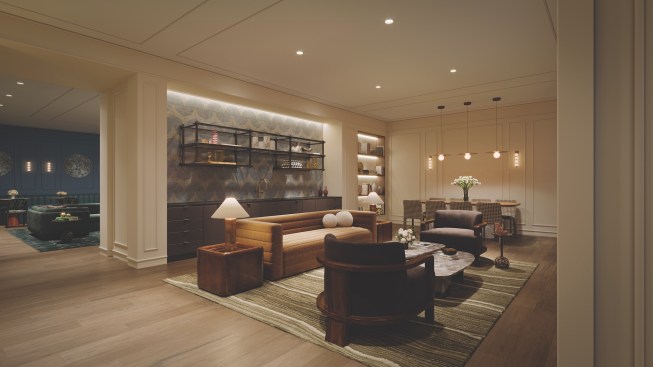 Amenities at 160 Water St. in lower Manhattan include a wraparound roof deck, a gym with a plunge pool, coworking spaces, and a bowling alley.