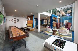 The resident lounge and game room at Glenwood at Grant Park.