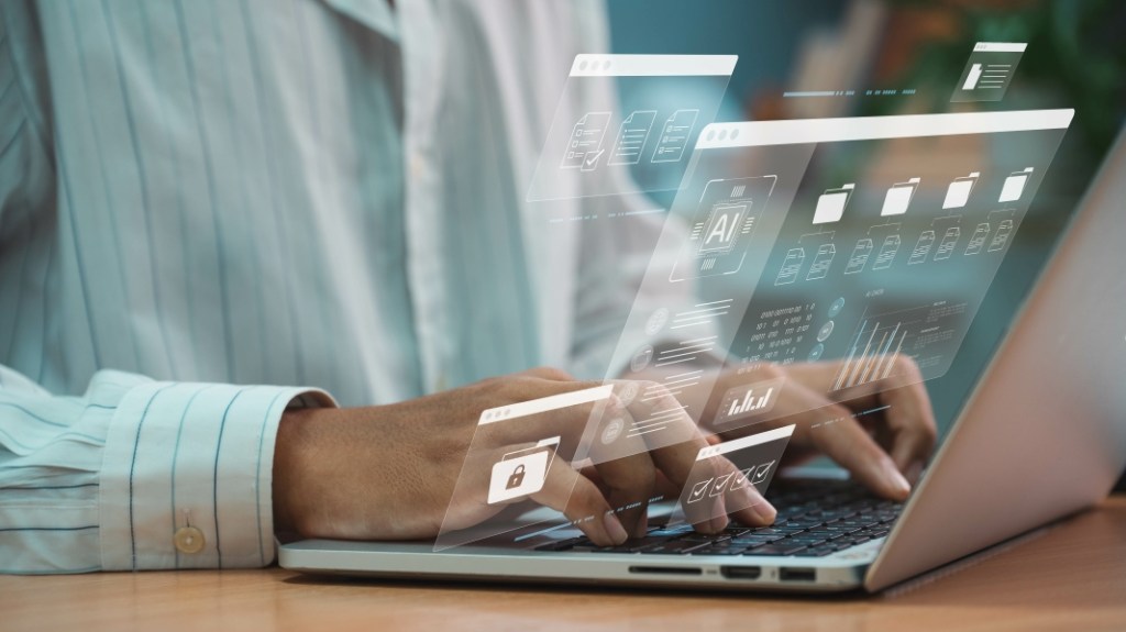 A person typing on a computer