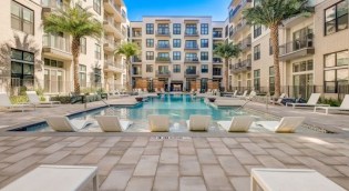 Developed in 2021, Augusta Flats is a community of five-story buildings with studio, one-, and two-bedroom apartments in historic downtown San Antonio.