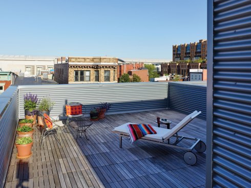 The four units at 1232–1234 10th St. in Northwest Washington, D.C., developed by architect Suzane Reatig, each feature a large terrace or roof deck.